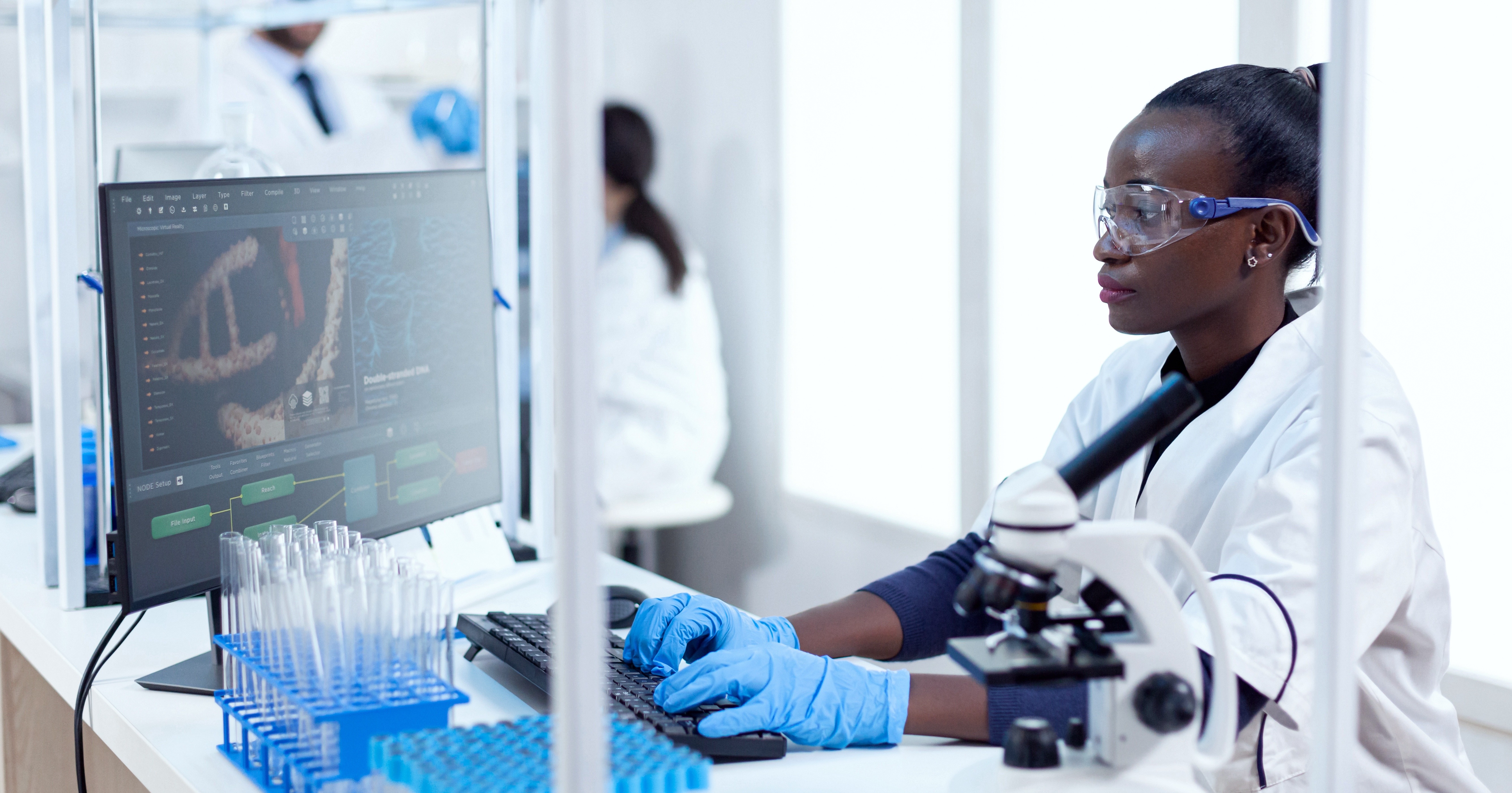 woman in lab on computer